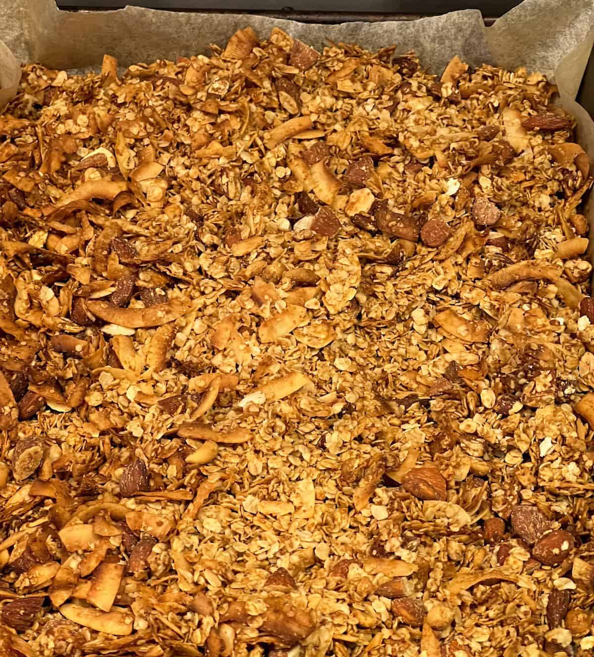 Crunchy peanut butter granola on a baking tray
