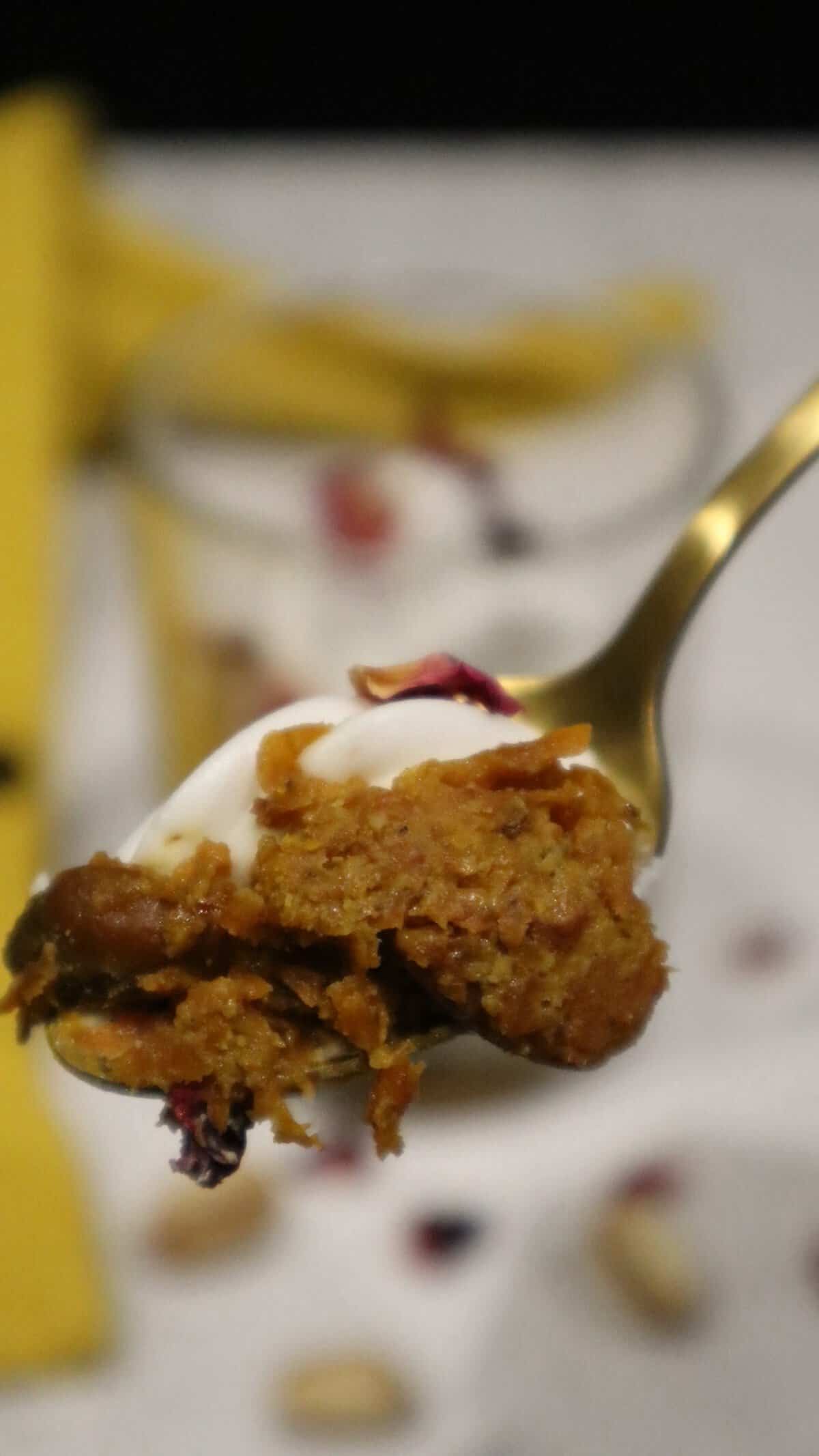 These highly indulgent vegan gajar halwa jars are a modern take on the classic Indian dessert gajar halwa or carrot halwa, topped with fresh coconut whipped cream and dry rose petals. 