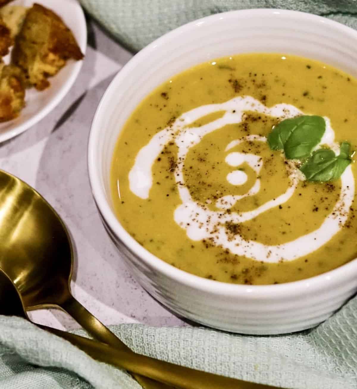 Courgette and carrot soup in a bowl