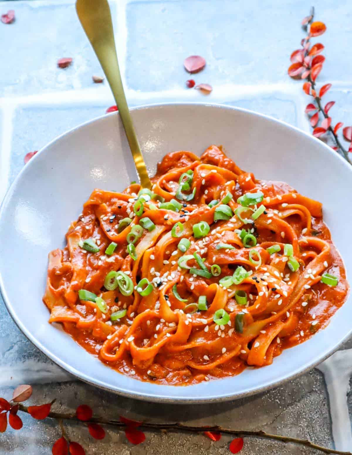 Creamy Gochujang pasta in a bowl with fork