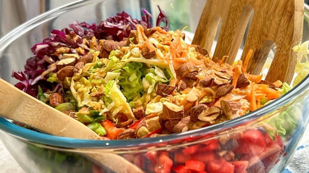 MIx all ingredients  for the Ultimate Asian Cabbage Salad with Creamy Soy Ginger Dressing